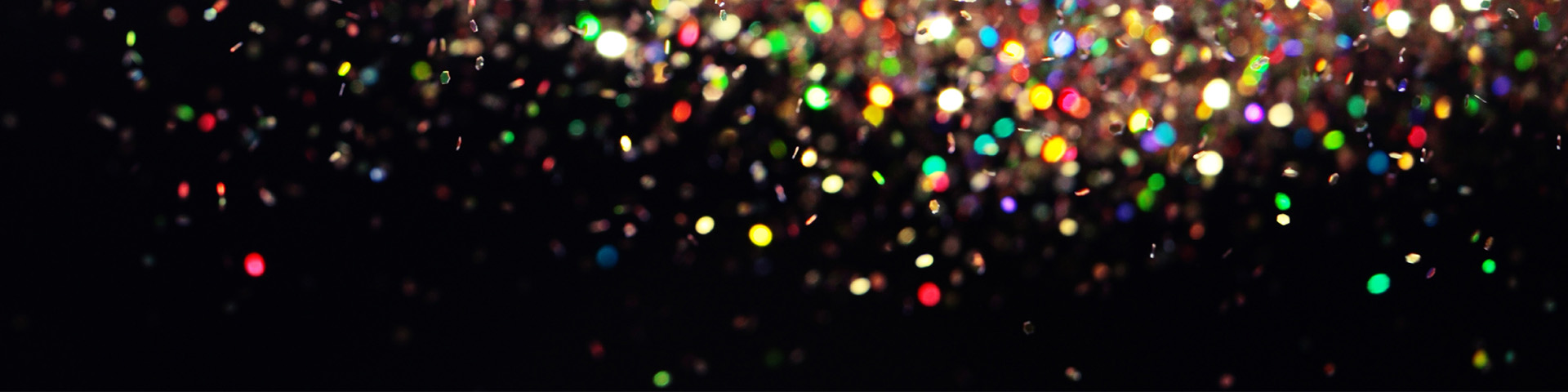 glitter sprinkles on black background