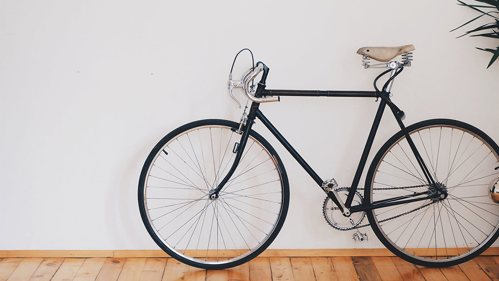 A bike propped against a wall