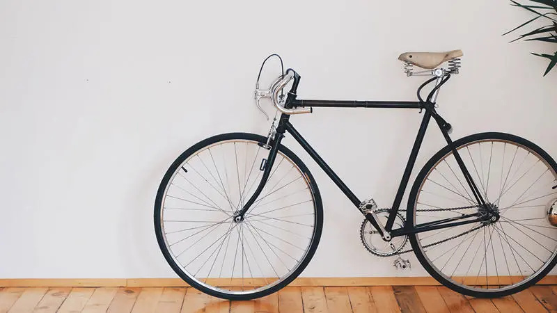 A bike propped against a wall