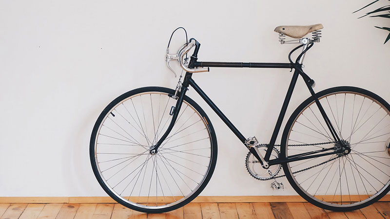 A bike propped against a wall
