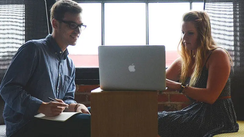 Students with a laptop