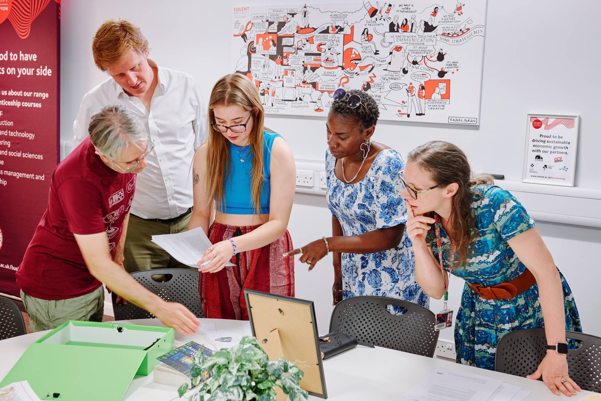 People gathered round table