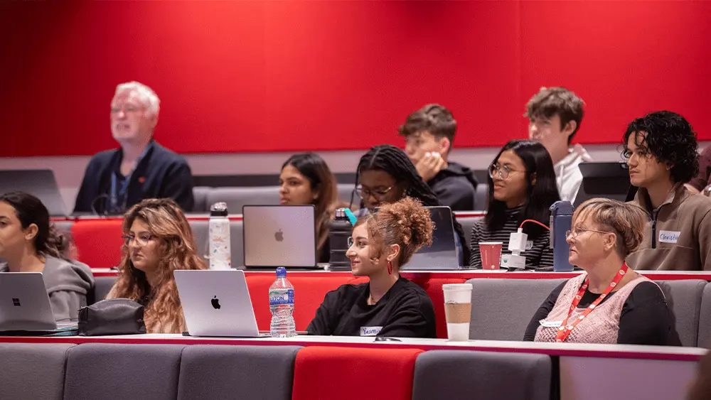 People sat in lecture theatre