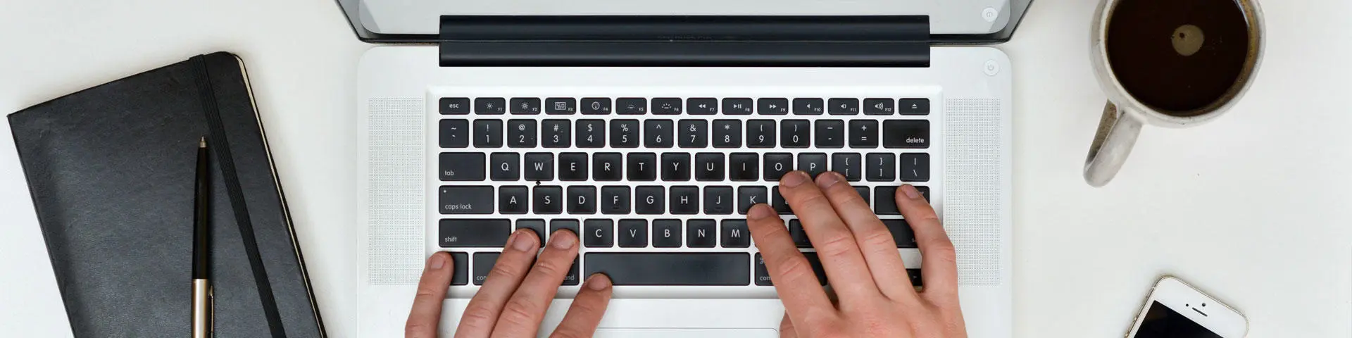 Student working on laptop from home