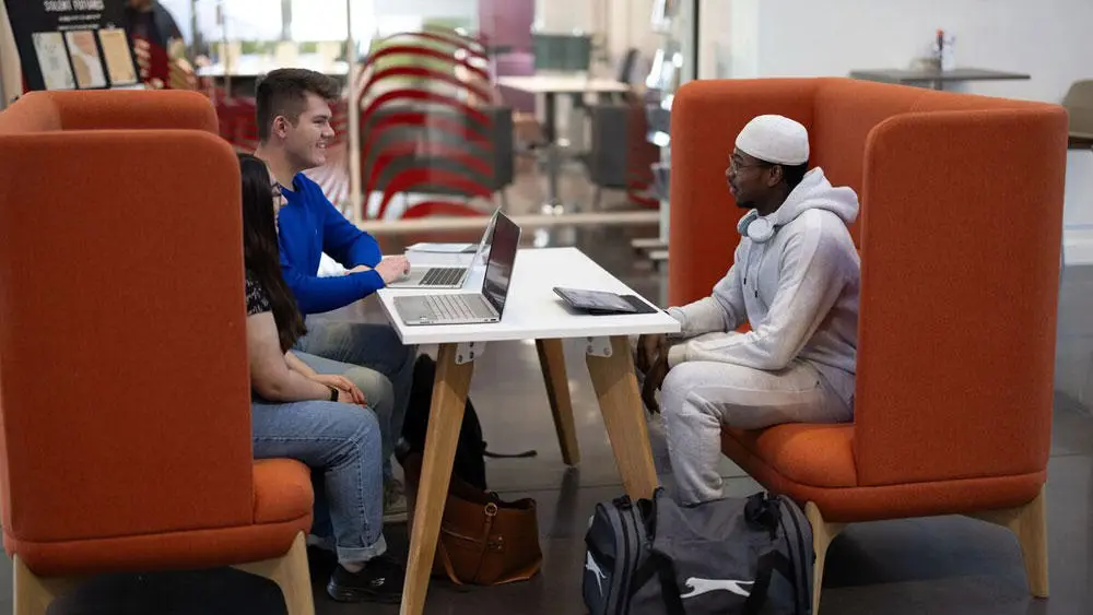 Students using the study space in the Spark Atrium