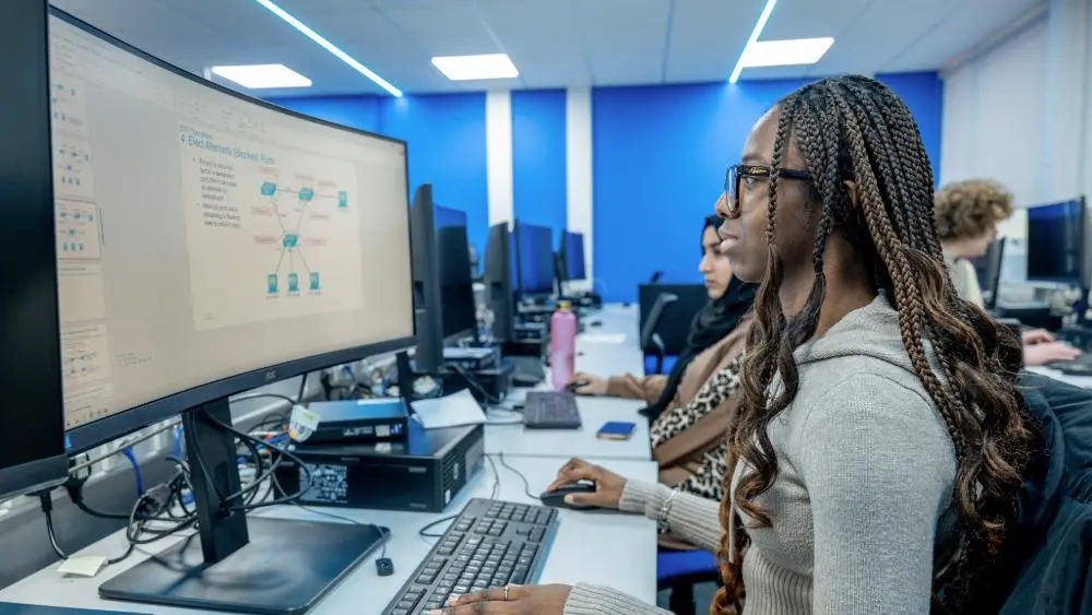 Student using a computer on campus