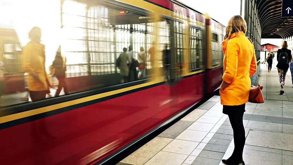 Person waiting at train station